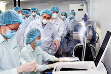 Người dân và Chính phủ đều chung một niềm tin chúng ta sẽ sớm có vắc xin Việt Nam và chiến thắng dịch bệnh trong một ngày không xa. Ảnh: VGP