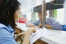 Nghị quyết số 02 năm 2021 yêu cầu tiếp tục thực hiện các mục tiêu về cắt giảm, đơn giản hóa quy định liên quan đến hoạt động kinh doanh. Ảnh: Lê Tiên