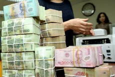 Việc xây dựng Luật về xử lý nợ xấu nhằm hoàn thiện khuôn khổ pháp lý, tạo cơ chế xử lý đồng bộ, hiệu quả nợ xấu và tài sản bảo đảm các khoản nợ của tổ chức tín dụng. Ảnh: Gia Khoa