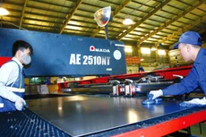 Việc mở rộng hình thức cho vay của Quỹ Hỗ trợ doanh nghiệp nhỏ và vừa sẽ gia tăng cơ hội tiếp cận nguồn vốn phục vụ sản xuất, kinh doanh cho doanh nghiệp Việt. Ảnh: Lê Tiên