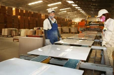 Doanh nghiệp gạch ốp lát đã trải qua năm 2020 đầy khó khăn. Ảnh: Nhã Chi