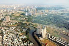 Một số văn bản pháp luật mới được ban hành đã tháo gỡ được điểm nghẽn của các dự án bất động sản, góp phần tăng nguồn cung dự án và sản phẩm nhà ở ra thị trường. Ảnh: Lê Tiên