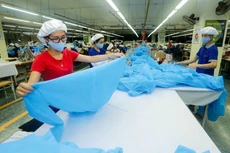 Gói thầu số 04 Khẩu trang N95 hoặc tương đương tại tỉnh Sóc Trăng mới đây áp dụng đấu thầu qua mạng đã thu hút 11 nhà thầu tham dự, đạt tỷ lệ tiết kiệm 82,23%. Ảnh: Trần Việt