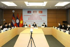 Đoàn Việt Nam tham dự Hội nghị lần thứ 8 Ủy ban Đối ngoại của Quốc hội Campuchia - Lào - Việt Nam về khu vực Tam giác phát triển tại điểm cầu Hà Nội. Ảnh: Minh Thành