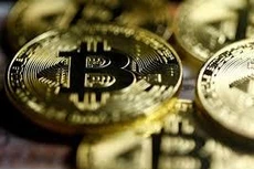 Giá Bitcoin lại lập đỉnh mới, vượt 52.000 USD/đồng
