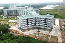 Luật Nhà ở 2014 không cấm các ngân hàng thương mại cung cấp tín dụng ưu đãi cho các dự án nhà ở xã hội. Ảnh: Song Lê