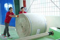 Chỉ có 14% DNNVV Việt Nam có khách hàng, đối tác là doanh nghiệp FDI. Ảnh: Nhã Chi