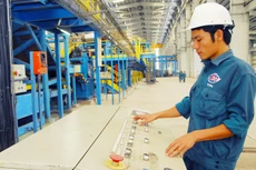 Các quy định về cạnh tranh cần được thực thi một cách nghiêm ngặt nhằm nâng cao hoạt động của DNNN. Ảnh: Lê Tiên