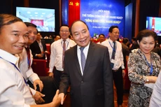 Chính phủ đã tổ chức hàng chục hội nghị xúc tiến đầu tư, hàng trăm cuộc đối thoại với doanh nghiệp. Ảnh: Quang Hiếu