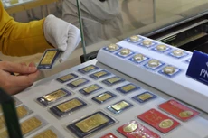 Giá vàng tăng nhẹ sáng nay, trong khi USD đi xuống. Ảnh:Lệ Chi.