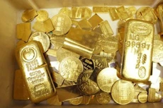 Giá vàng được dự báo sẽ tăng trở lại mốc 1.400 USD trong năm 2017. Ảnh:AFP.