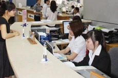 Năm 2016, doanh thu của Trung tâm Lưu ký chứng khoán Việt Nam đạt hơn 400 tỷ đồng, tăng 20% so với năm 2015. Ảnh: Tường Lâm