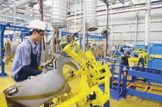 Nhiều tín hiệu cho thấy tăng trưởng kinh tế của năm 2017 có thể đạt được 6,7%. Ảnh: Tường Lâm