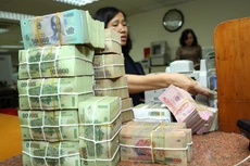 Mục tiêu huy động trái phiếu chính phủ năm 2017 là 250.000 tỷ đồng. Ảnh: Lê Tiên