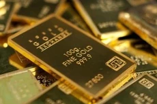 Giá vàng chịu áp lực vì đồng USD mạnh