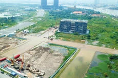 Xác định năng lực tài chính của người tham gia đấu giá là vấn đề được đặt ra trong thực tiễn đấu giá tài sản nói chung và đấu giá quyền sử dụng đất nói riêng. Ảnh: Lê Tiên