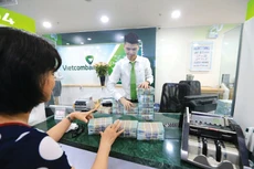 Đến ngày 29/9/2023, tín dụng toàn nền kinh tế đạt khoảng 12,749 triệu tỷ đồng, tăng 6,92% so với cuối năm 2022, thấp hơn đáng kể so với con số gần 11% của cùng kỳ năm ngoái. Ảnh: Minh Dung