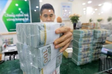 Việc giữ được tỷ giá trong biên độ phù hợp sẽ thúc đẩy hoạt động xuất khẩu, góp phần kiểm soát lạm phát và ổn định kinh tế vĩ mô. Ảnh: Nhã Chi