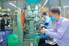Không chỉ các ngân hàng chờ room tín dụng, các doanh nghiệp cũng ngóng chỉ tiêu này để nắm bắt cơ hội kinh doanh. Ảnh: Lê Tiên