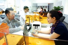 Nếu Fed tiếp tục tăng lãi suất, Ngân hàng Nhà nước sẽ gặp khó khăn trong việc ổn định và giảm mặt bằng lãi suất cho vay. Ảnh: Nhã Chi