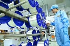Sự phục hồi của khu vực doanh nghiệp sẽ là động lực cho tăng trưởng kinh tế trong các tháng cuối năm. Ảnh: Lê Tiên