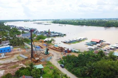 Theo Bộ Giao thông vận tải, tổng mức đầu tư Dự án cầu Rạch Miễu 2 dự kiến tăng thêm 1.183,69 tỷ đồng, chủ yếu do phát sinh chi phí giải phóng mặt bằng. Ảnh: BB