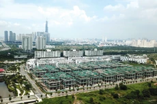 Để trụ lại trên thương trường, nhiều doanh nghiệp bất động sản phải tìm cách tái cấu trúc, tái cơ cấu đầu tư, thay đổi phương án kinh doanh, chuyển nhượng bớt dự án… Ảnh: Song Lê