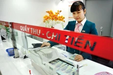 Từ tháng 1/2023 đến nay, lãi suất tiền gửi kỳ hạn 12 tháng của các ngân hàng đã giảm khoảng 0,5 điểm %, hiện ở mức 7,1 - 8,4% đối với kỳ hạn 12 tháng. Ảnh: Nhã Chi