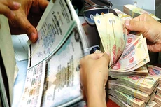 Đến cuối năm 2022, trị giá trái phiếu doanh nghiệp các ngân hàng Việt Nam đang nắm giữ khoảng 190 nghìn tỷ đồng, tương đương gần 8 tỷ USD. Ảnh: Hải An