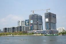 Việc hoán đổi trái phiếu thành bất động sản là một giải pháp giúp doanh nghiệp trả nợ, song lại tiềm ẩn rủi ro với nhà đầu tư. Ảnh: Tiên Giang