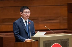 Bộ trưởng Bộ Tài chính Hồ Đức Phớc thừa ủy quyền của Thủ tướng Chính phủ trình bày Báo cáo về công tác thực hành tiết kiệm, chống lãng phí năm 2022. Ảnh: quochoi.vn