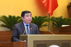 Bộ trưởng Nguyễn Chí Dũng phát biểu trong phiên họp chiều 29/10. (Ảnh: Trung tâm báo chí Quốc hội)