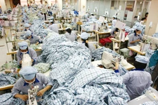 Cải cách, cải thiện môi trường kinh doanh là giải pháp “phi tài chính” có ý nghĩa lớn hỗ trợ doanh nghiệp và nền kinh tế phục hồi sau đại dịch. Ảnh: Tường Lâm