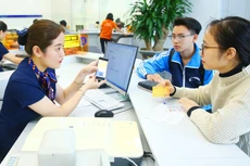 Hoạt động góp vốn, mua cổ phần của nhà đầu tư nước ngoài tại các tổ chức tín dụng góp phần nâng cao năng lực tài chính, tiếp cận các chuẩn mực quốc tế về quản trị ngân hàng. Ảnh minh họa: Tiên Giang