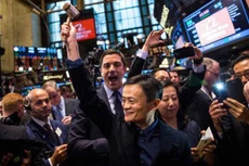 Người sáng lập Alibaba Group Holding, Jack Ma, ăn mừng sự kiện niêm yết trên sàn chứng khoán New York vào tháng 9/2014 - Ảnh: Getty Images