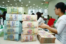 Ủy ban Tài chính - Ngân sách của Quốc hội cho rằng, việc dự toán khoản thu ngân sách nhà nước năm 2022 từ các khu vực sản xuất, kinh doanh chưa tương xứng với tốc độ tăng trưởng kinh tế dự kiến. Ảnh: Nhã Chi