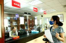 Trong gần 4 năm qua (2016 - 2019), các bộ, ngành đã trình ban hành 29 văn bản quy phạm pháp luật để cắt giảm 3.425/6.191 điều kiện kinh doanh. Ảnh: Lê Tiên