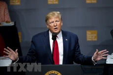 Tổng thống Trump khẳng định ông đã trả hàng triệu USD tiền thuế. (Ảnh: AFP/TTXVN)