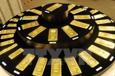 Giá vàng thế giới tăng sau quyết định của Fed. Ảnh minh họa: TTXVN