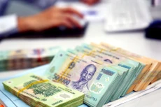 Đến tháng 6/2020, tỷ lệ nợ xấu nội bảng của hệ thống các tổ chức tín dụng là dưới 2%. Ảnh: Nhã Chi