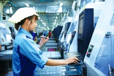 Bối cảnh dịch Covid-19 là cơ hội cho doanh nghiệp cải thiện hệ thống sản xuất, đầu tư công nghệ, nguồn nhân lực. Ảnh: Lê Tiên