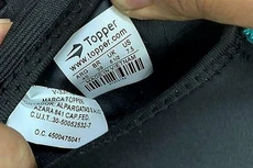 Lô hàng giày Topper xuất đi từ Trung Quốc nhưng mác lại ghi "Made in Vietnam". Ảnh: HQ