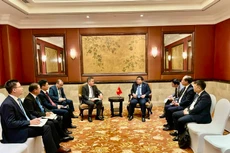 Trao đổi ý kiến với đại diện CCCC, Bộ Trưởng Nguyễn Chí Dũng đánh giá cao về quy mô và thành tựu hoạt động đầu tư kinh doanh của Tập đoàn tại Việt Nam và trên toàn cầu.. Ảnh: TN