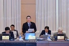 Chủ nhiệm Ủy ban Tài chính - Ngân sách Nguyễn Đức Hải trình bày báo cáo thẩm tra. Ảnh: Quochoi.vn