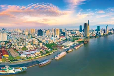 Hà Nội và TP. Hồ Chí Minh phải tăng trưởng hai con số để khẳng định vai trò đầu tàu dẫn dắt tăng trưởng của cả nước. Ảnh: Đông Giang
