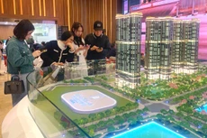 Tính đến hết tháng 3/2025, dư nợ tín dụng kinh doanh bất động sản đạt hơn 1,56 triệu tỷ đồng, tăng khoảng 260.000 tỷ đồng so với cuối năm 2024. Ảnh: Lê Tiên