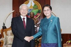 Tổng Bí thư Nguyễn Phú Trọng hội kiến Chủ tịch Quốc hội Lào. Ảnh: TTXVN