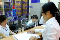 Hà Nội kiểm tra, rà soát, có giải pháp tháo gỡ khó khăn, bất cập trong việc cấp Giấy phép xây dựng Ảnh: Tường Lâm