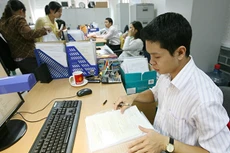 Trong tháng 11/2016, cả nước có 9.918 doanh nghiệp (DN) thành lập mới. Ảnh: Tường Lâm 