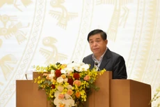 Bộ trưởng Bộ KH&ĐT Nguyễn Chí Dũng trình bày tham luận tại Hội nghị Chính phủ với địa phương. Ảnh: VGP